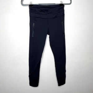 Lululemon Black Side Hip Zip Pockets Mesh Detail Waist & Ankle 7/8 Leggings 4